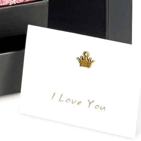 a greeting card with a crown on it