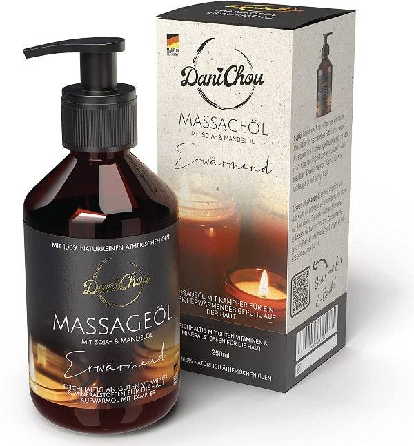 a bottle of massage oil next to a box