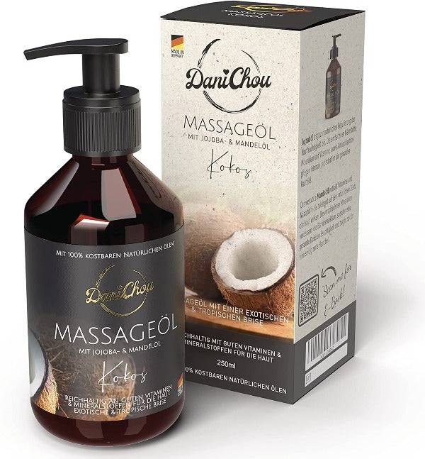 a bottle of massage oil next to a box