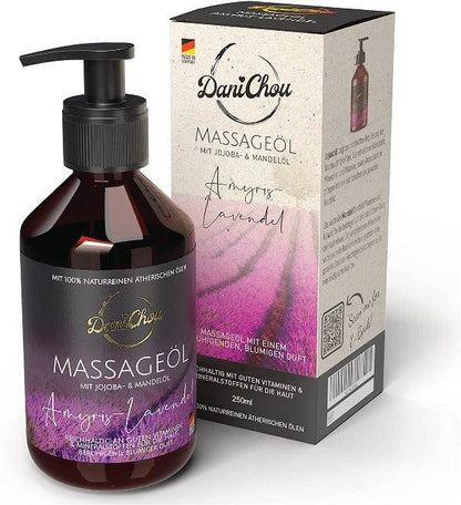 a bottle of massage oil next to a box