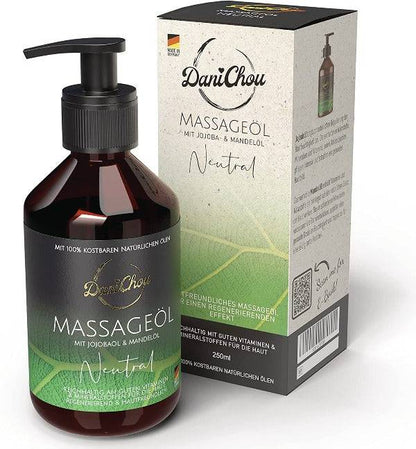 a bottle of massage oil next to a box