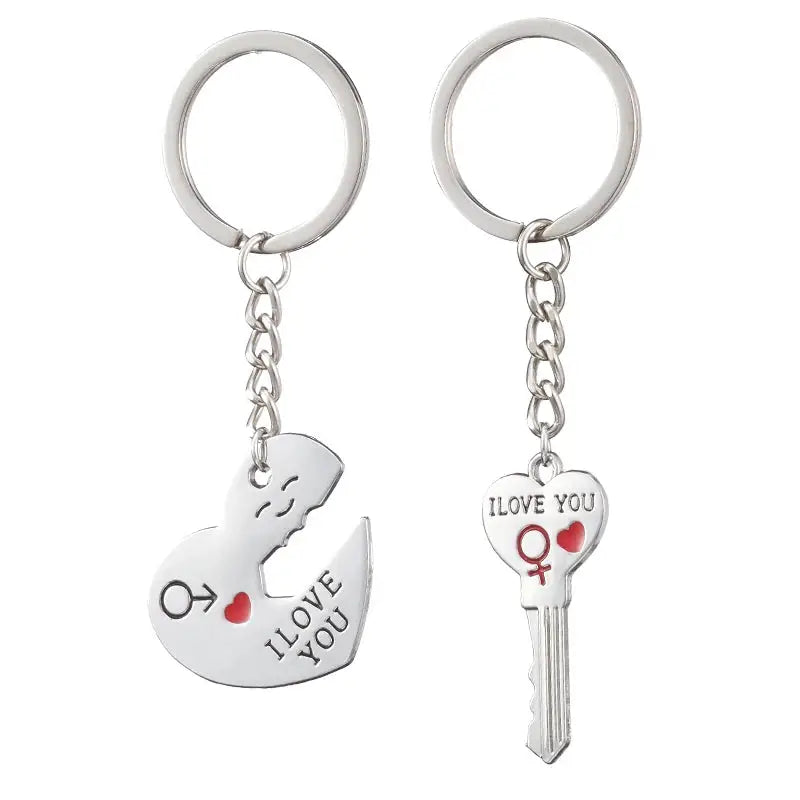 two key chains with a heart and a keychain that says i love you