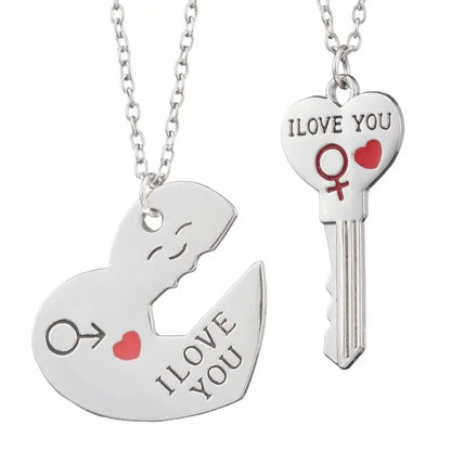 two necklaces with two keys attached to them