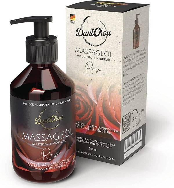 a bottle of massage oil next to a box